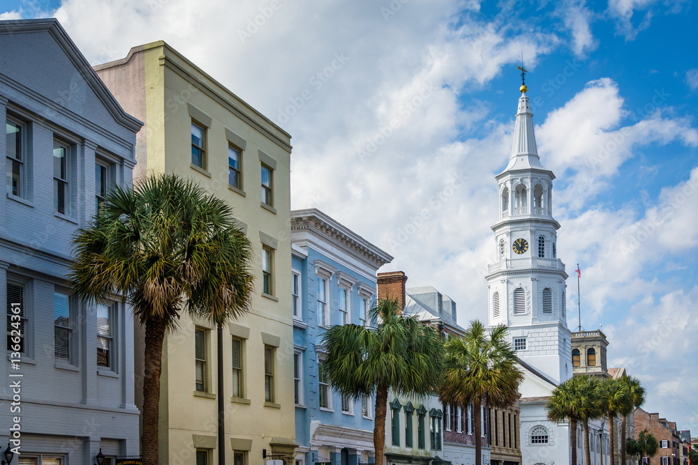 Fototapeta premium Buildings and palm trees along Broad Street, in Charleston, Sout