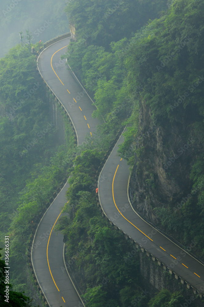 Photo of Curved Rock Mountain Road. Epic Mountain Landscape