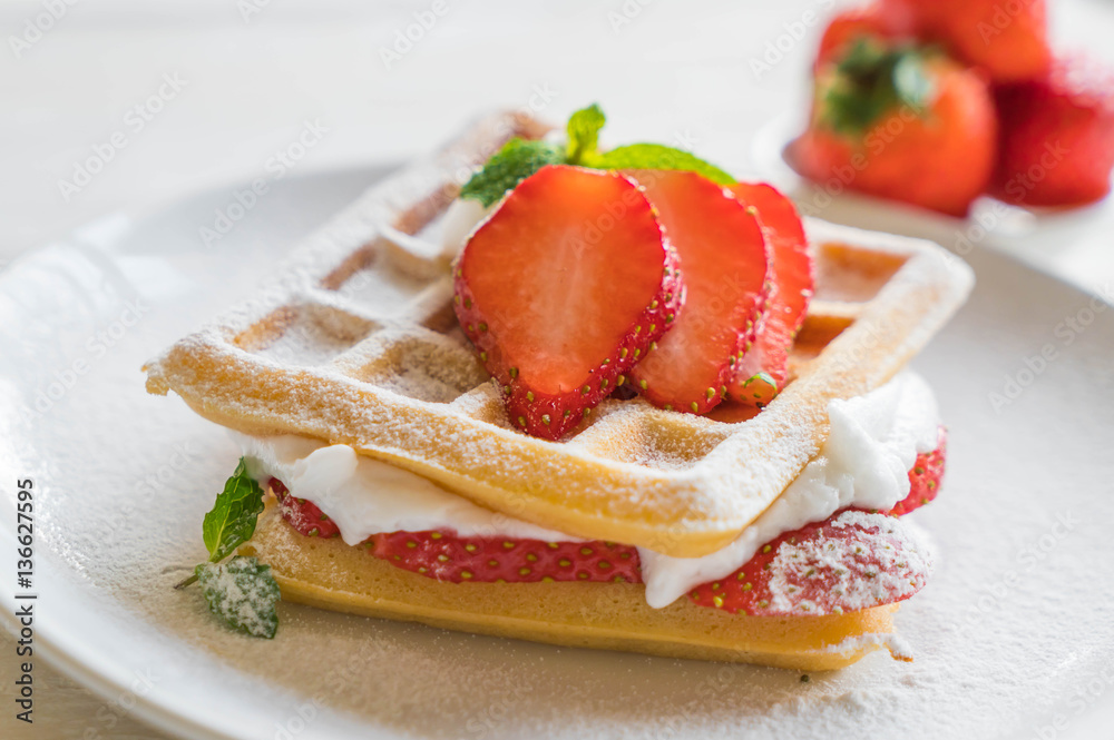 waffle with strawberry on wood waffle with strawberry on wood