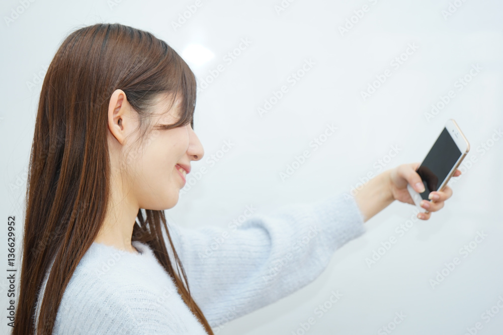 Young woman taking selfie photos with smile Young woman taking selfie photos with smile