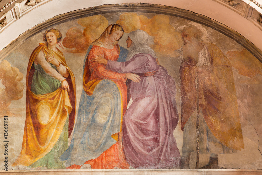 BRESCIA, ITALY - MAY 22, 2016: The fresco of The Visitation in church Chiesa di San Francesco d Assisi by Francesco Prata da Caravaggio (1520).