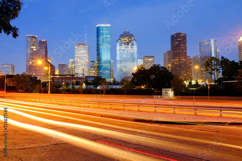 Houston Downtown at night, with light trail, blue sky