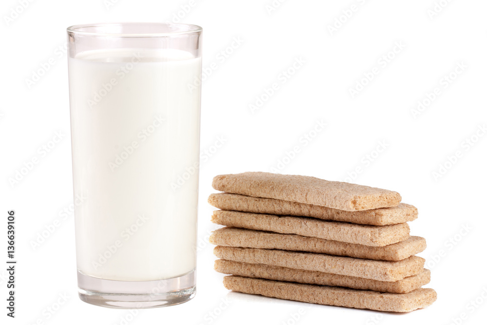 glass of milk with stack of grain crispbreads isolated on white background glass of milk with stack of grain crispbreads isolated on white background