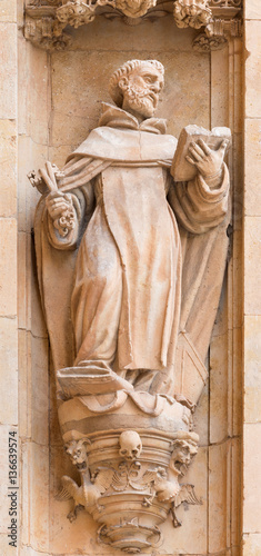 SALAMANCA, SPAIN, APRIL - 17, 2016: The St. Peter the Apostle as the detail from portal of Convento de San Esteban by Juan Ribero de Rada (1590 - 1592). photo