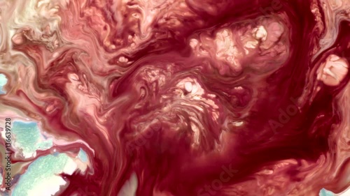 Swirling colours and patterns in liquid created with chemical reactions