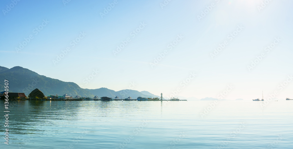 Panorama scenic view sunrise of the harbor with mountain backgro Panorama scenic view sunrise of the harbor with mountain backgro