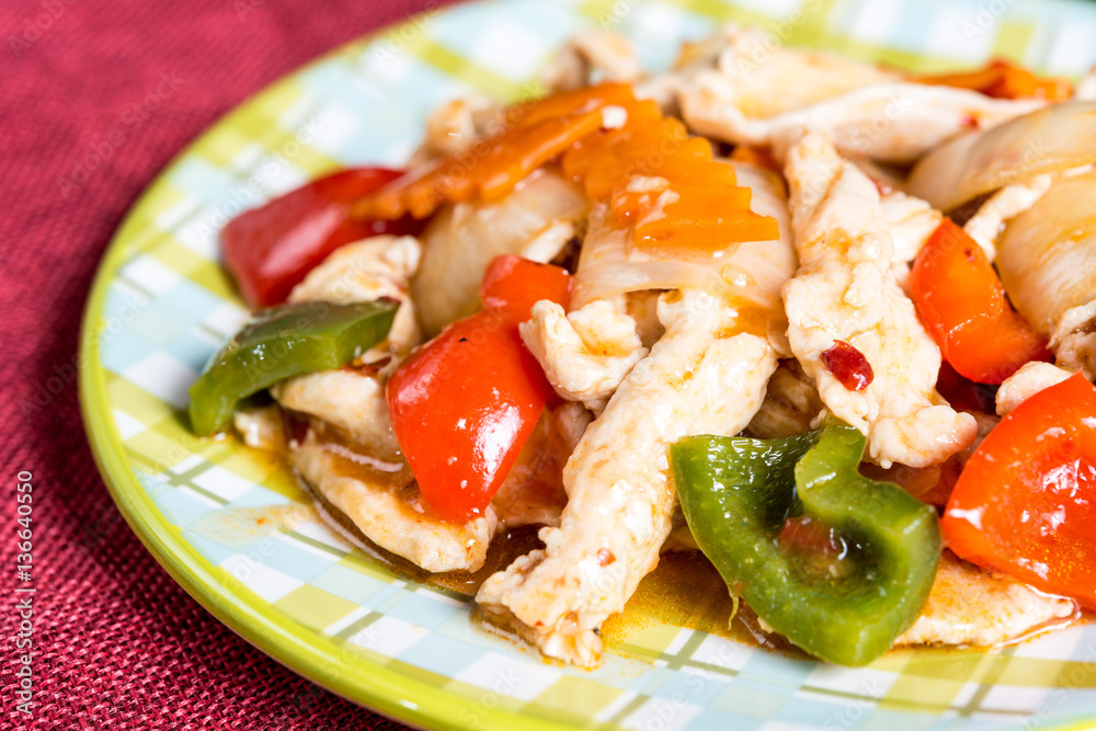 wok fried chicken stir fry with sweet peppers and chinese vegeta wok fried chicken stir fry with sweet peppers and chinese vegeta