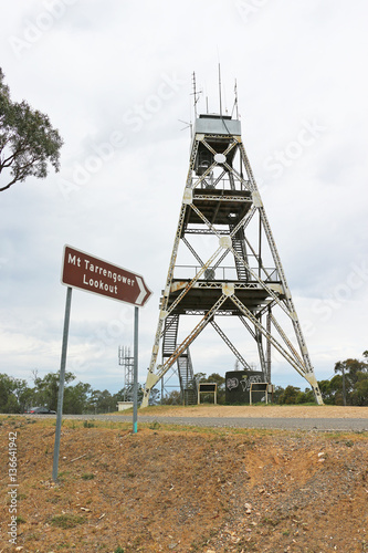 MALDON, VICTORIA, AUSTRALIA - October 16, 2015: The Mt Tarrengower poppet-head lookout, used as a fire-spotting tower since 1950, can be climbed to enjoy 360-degree views over Maldon and surrounds