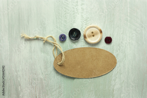Kraft cardboard tag with twine and retro buttons