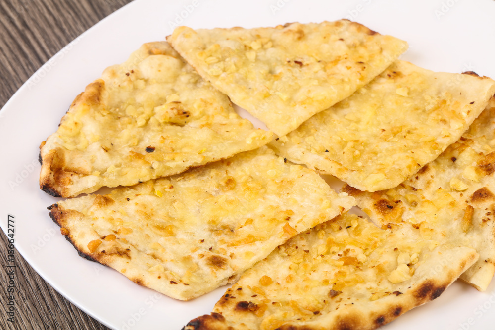 Naan with cheese and garlic Naan with cheese and garlic