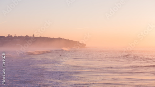 Surfers waiting for their wave at sunrise © Halans Photography