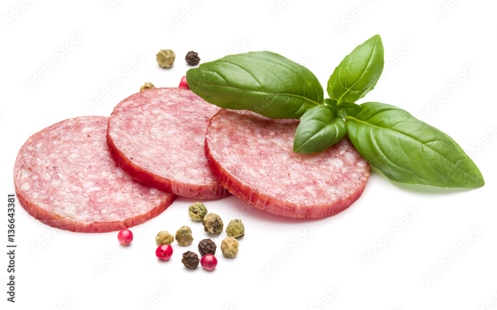 Salami smoked sausage three slices, basil leaves and peppercorns