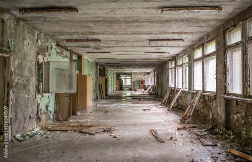gloomy school corridor with debris in Pripyat © tan4ikk