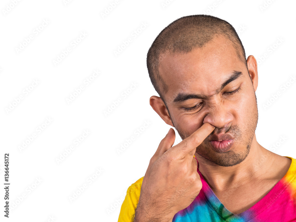 Asian man picking his nose isolated on white Asian man picking his nose isolated on white