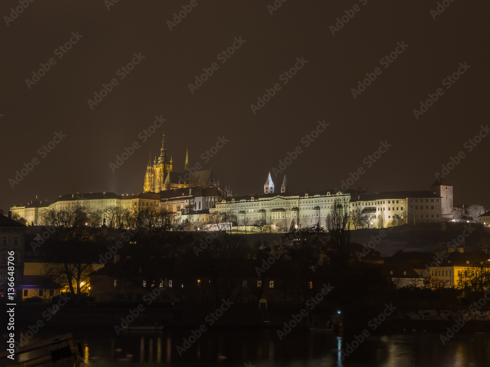 Prague is the capital of the Czech Republic. political and cultural center of Bohemia. Its historic center was included in the Unesco World Heritage. landscape at the castle in the night.