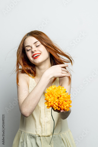 romantic woman with yellow flower