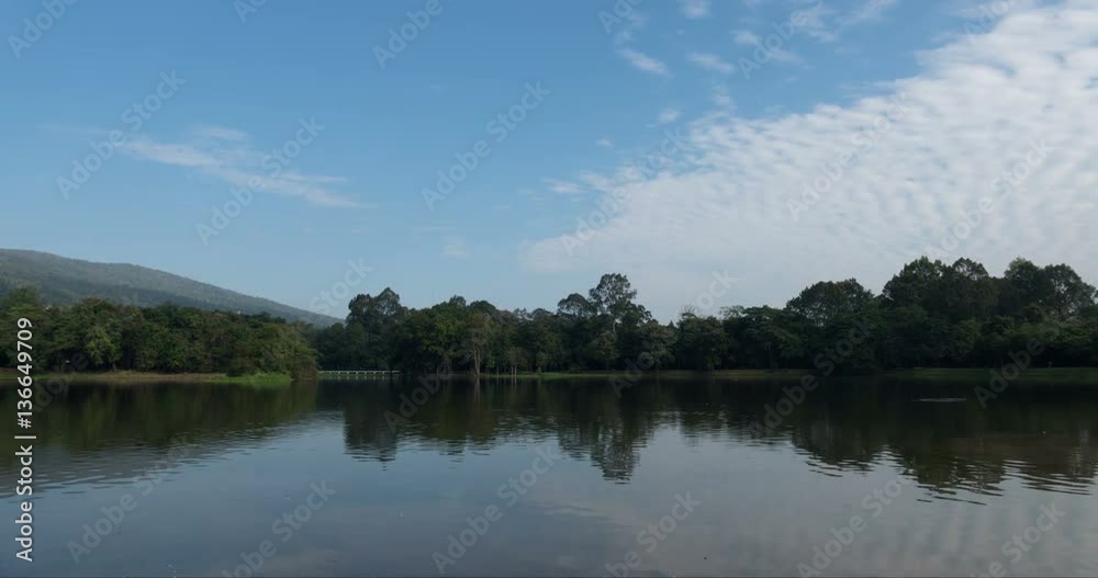 landscape of mountain and pond in park in the morning - time lapse landscape of mountain and pond in park in the morning - time lapse
