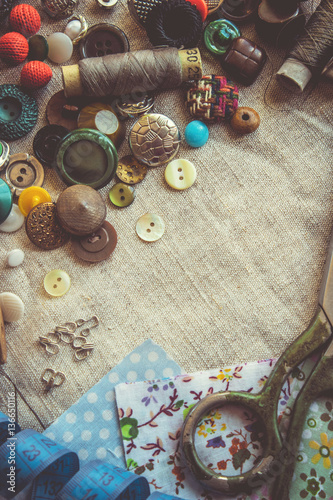 Scissors for cutting fabrics,patterns, fabrics,threads and buttons. Selective focus.  photo