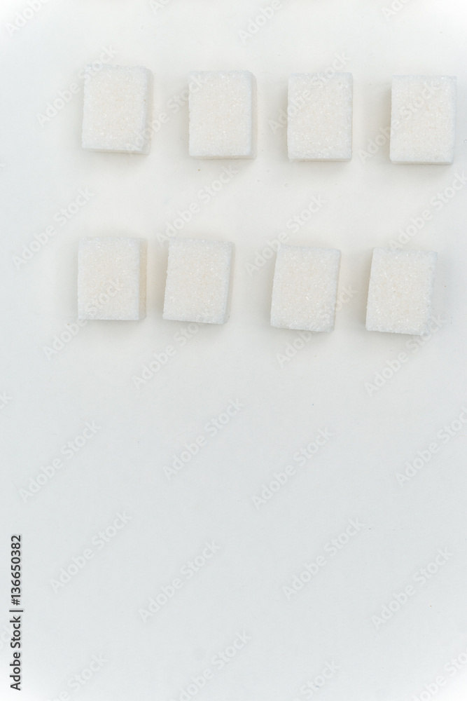 Cubes of white sugar on the table Cubes of white sugar on the table