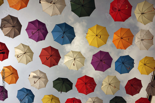 Wallpaper Mural Colorful umbrellas background. Colorful umbrellas in the sky. Street decoration. Torontodigital.ca