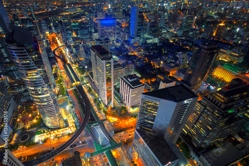 Aerial view of Bangkok modern office buildings, condominium in Bangkok city downtown with sunset sky , Bangkok , Thailand © weerasak