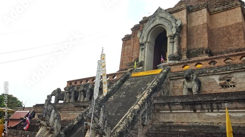 4K Golden Buddha statue called Phra Chao Attarot, eighteen-cube Buddha outside the temple at Wat Chedi Luang, a Buddhist temple in the historical center of Chiang Mai.-Dan photo