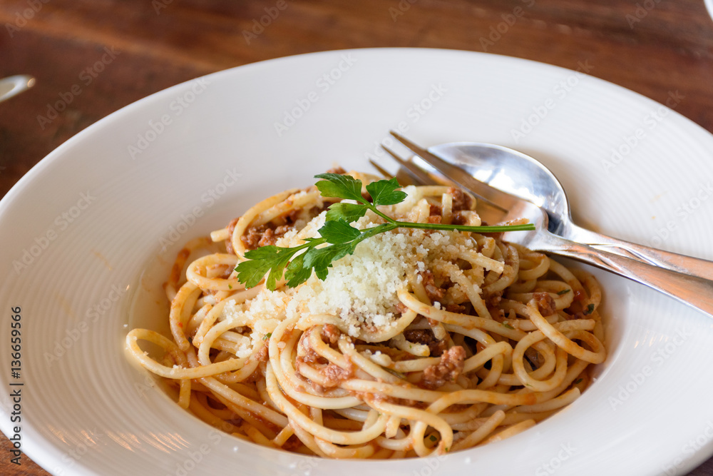 Delicious spaghetti with meat on white plate Delicious spaghetti with meat on white plate