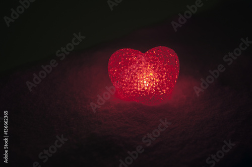 abstract glass heart on snow at night. Card for a Valentine s day. Forgive me  miss you love you words red or greyscale colored. selective