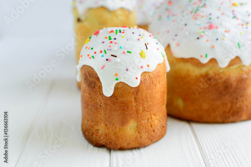 Traditional Easter cake kulich on white background photo