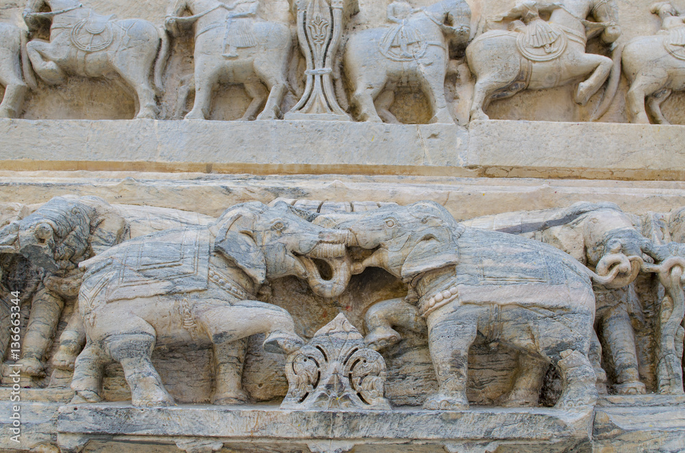 sculptural relief with the image of living beings
