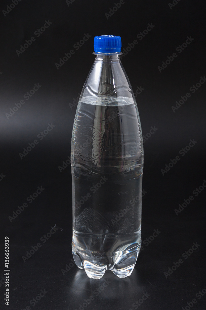 water bottle isolated on black background. water bottle isolated on black background.