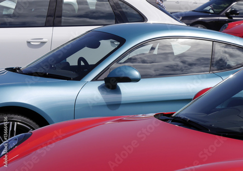 Sports cars in parking lot