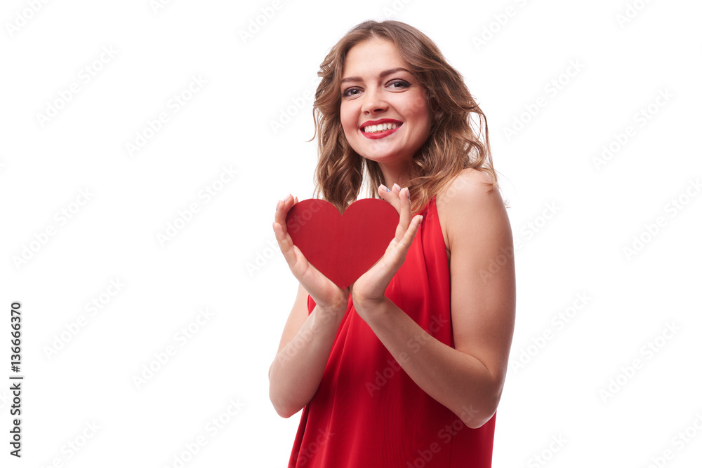 Sensual curled brunette in red dress holding greeting card Sensual curled brunette in red dress holding greeting card