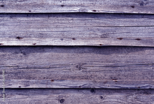 Blue toned wooden wall surface.