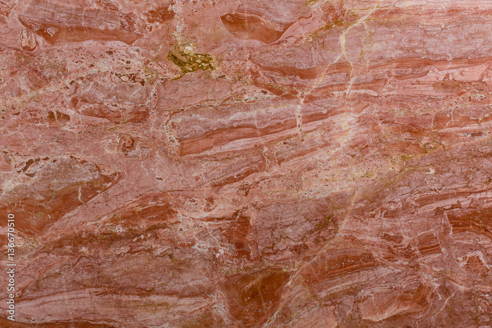 Red marble background close up, detail texture.