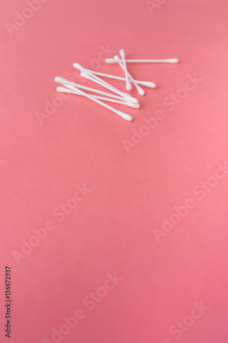 cotton swabs and sponge. Hygiene Red background