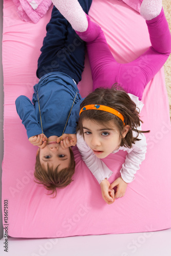 Photos Childrea lying in bed