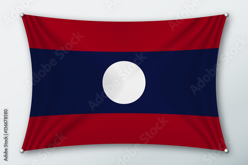 Free Download Laos national flag. Symbol of the country on a stretched fabric with waves attached with pins. Realistic vector illustration. - GFXLoad
