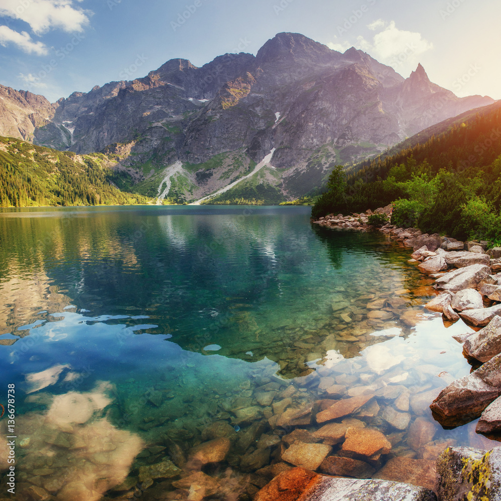 Lake high in the Tatras Sea Eye. Poland - obrazy, fototapety, plakaty 