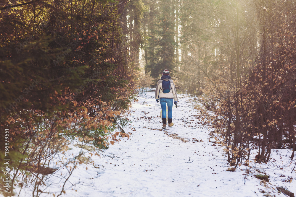 Woman walking in the woods Woman walking in the woods
