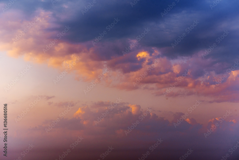 Romantic fantastic colorful clouds evening sky texture with diff