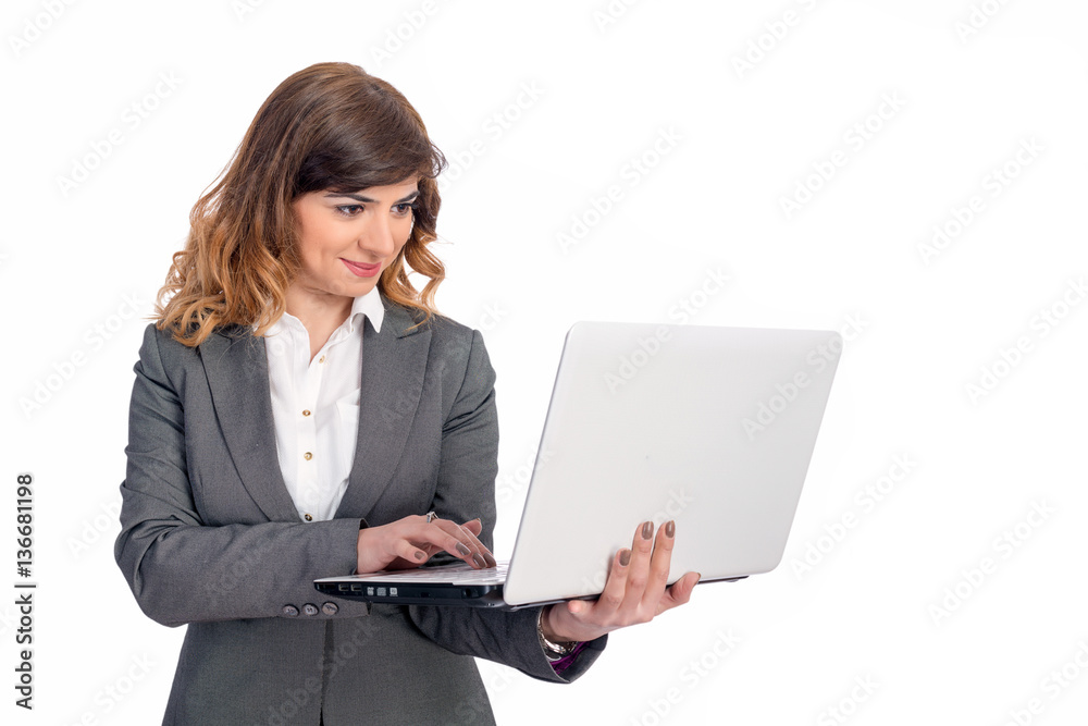 Young businesswoman with laptop, isolated on white Young businesswoman with laptop, isolated on white