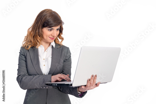 Young businesswoman with laptop, isolated on white