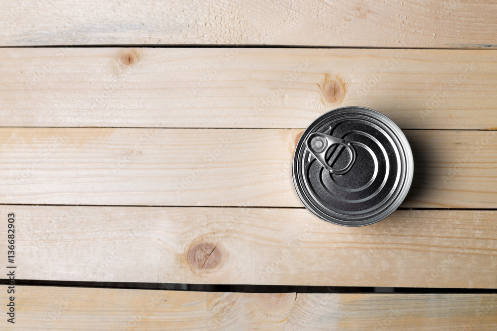 Fototapeta premium Tin cans for food on wooden background