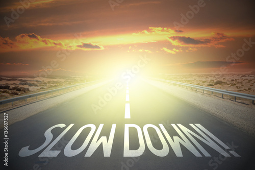 Fotografie Road concept - slow down