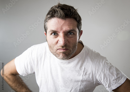 young attractive man with blue eyes looking angry and mad in rage emotion and upset © Wordley Calvo Stock