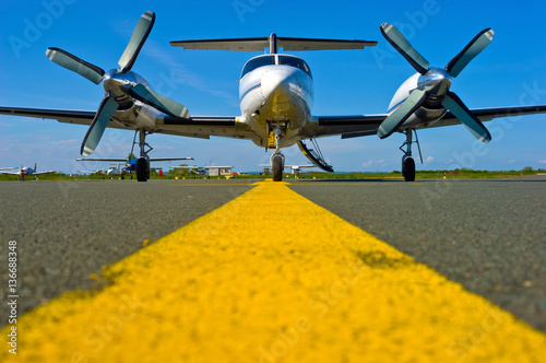 A Cheyenne IV parked on the apron waiting for passengers.