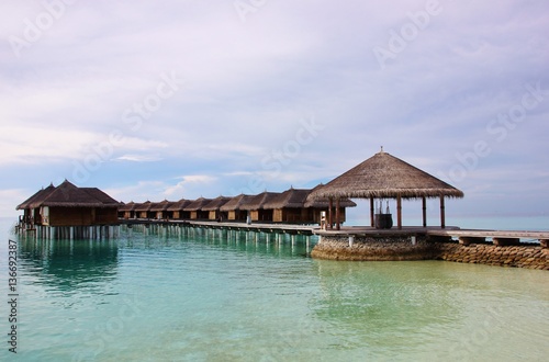 Wooden water villas in Maafushivaru atoll, Maldives