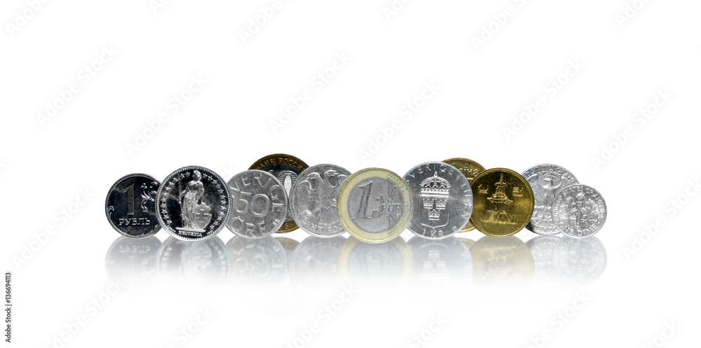 Range of various coins on white