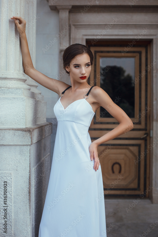 Fototapeta premium Beautiful woman posing long dress in Livadia